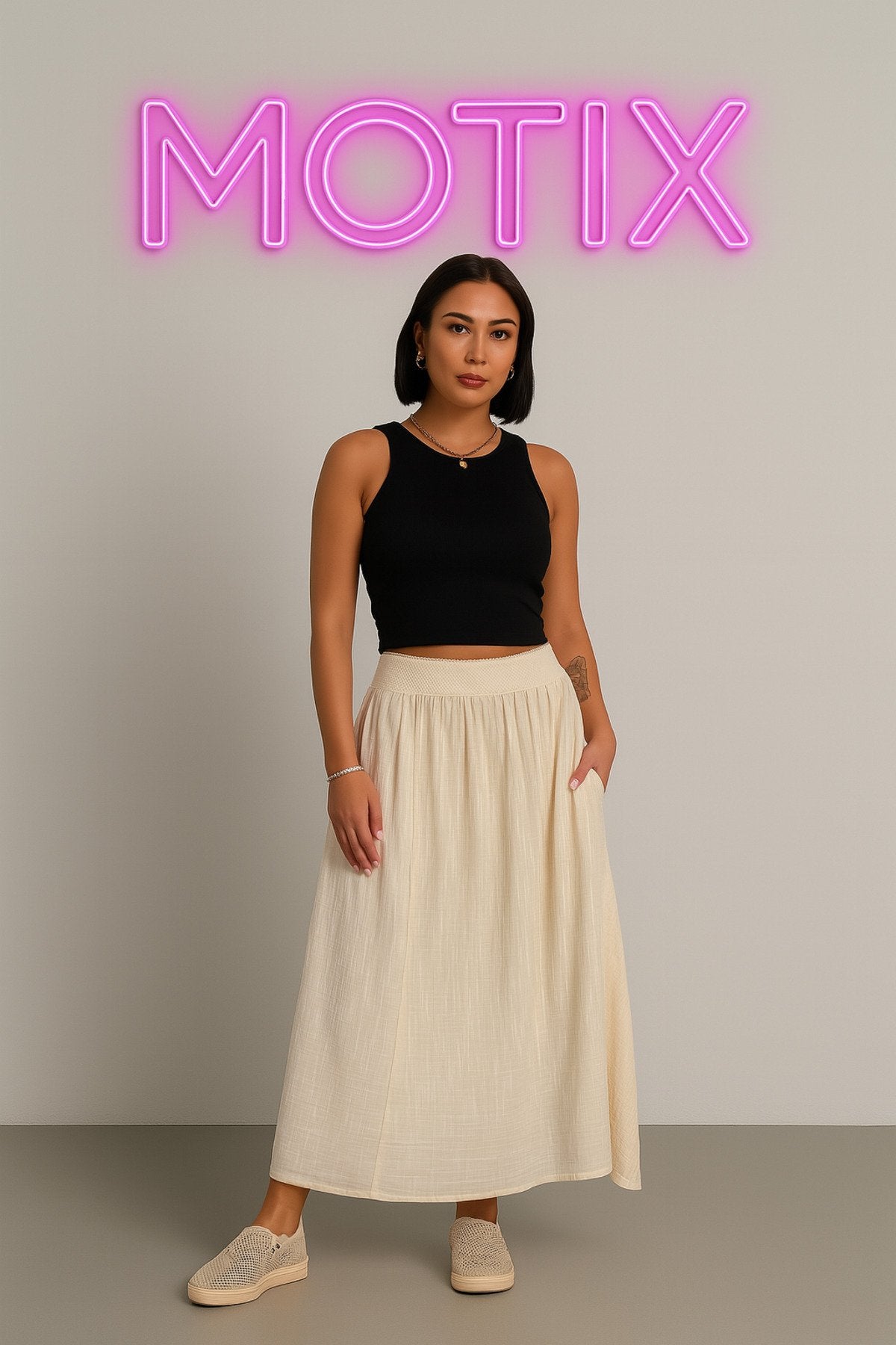 Doğal Şıklığın Simgesi: krem Renk Salaş Kesim Midi Etek