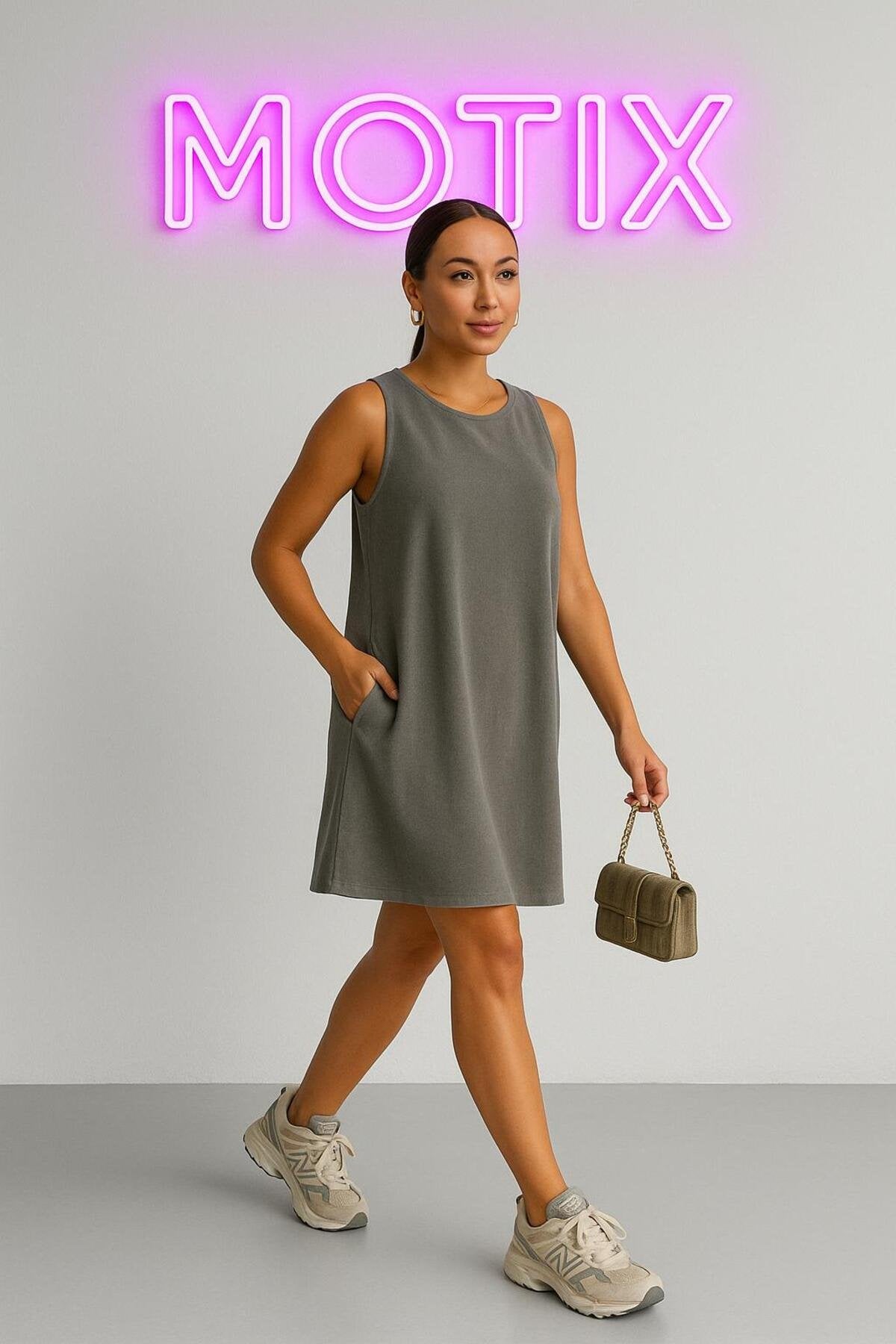 Basic Şıklığın Temsilcisi: Kolsuz Rahat Kesim Günlük Elbise