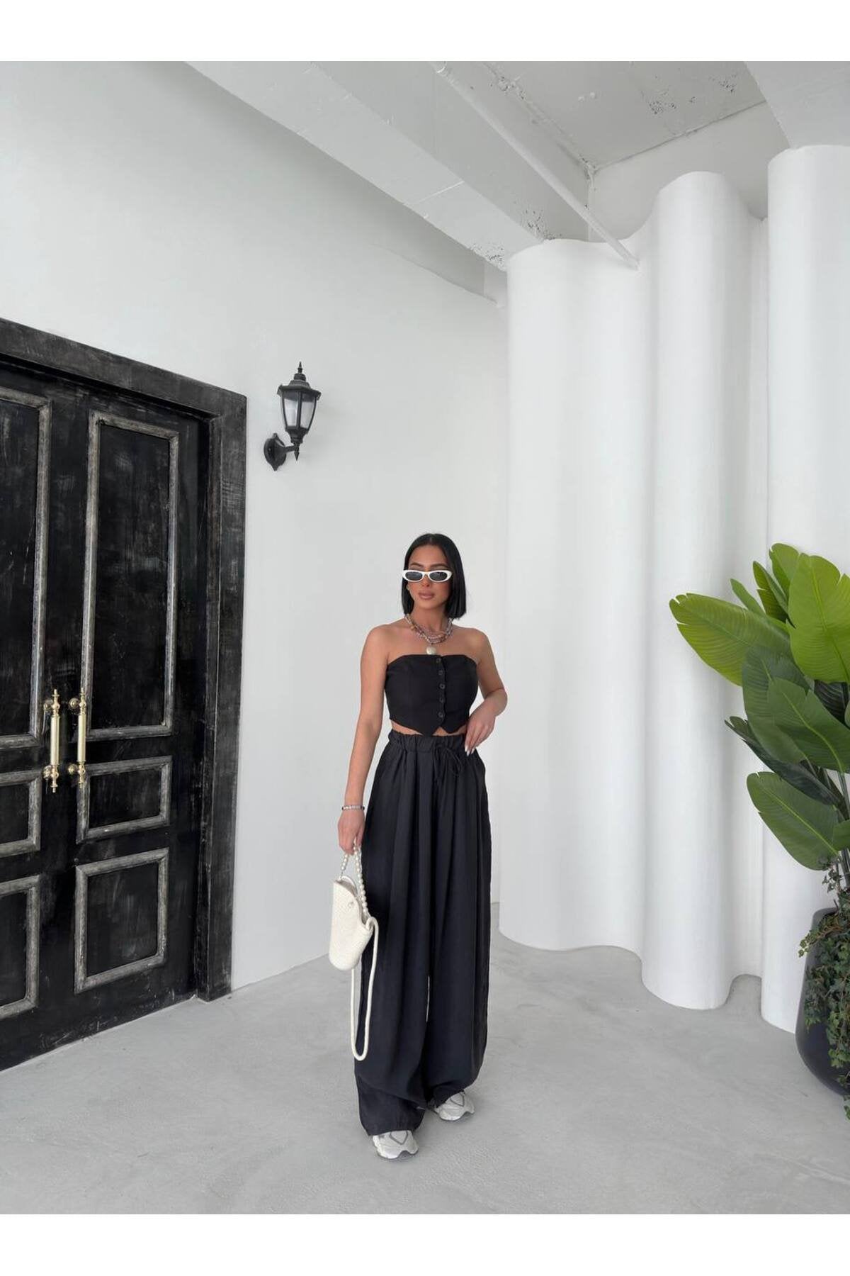 Zarif Detaylı Yüksek Bel Bol Paça Pantolon