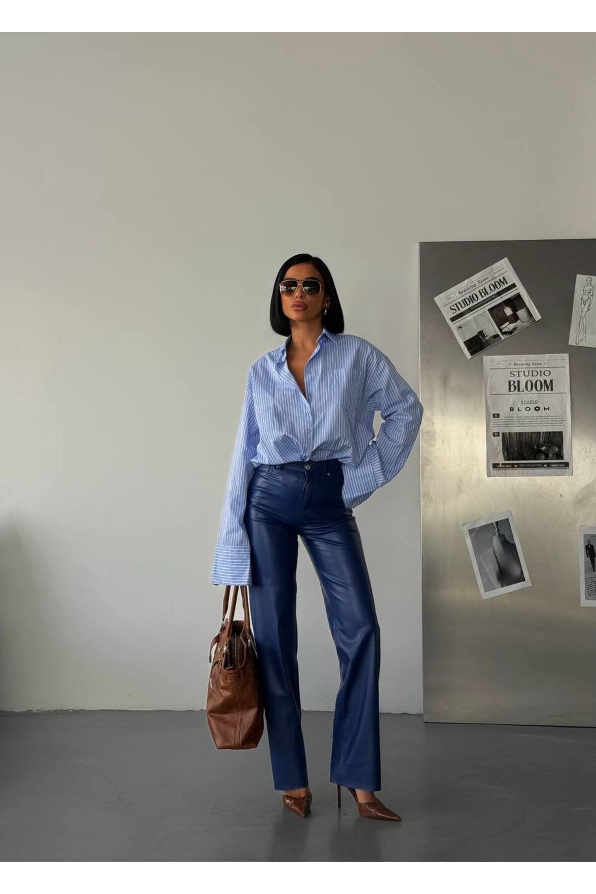 Modern ve Çarpıcı: Yüksek Bel Deri Pantolon