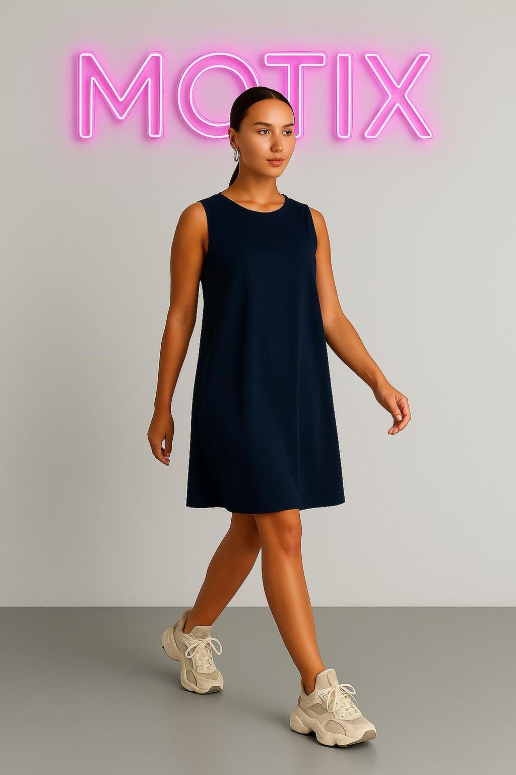 Basic Şıklığın Temsilcisi: Kolsuz Rahat Kesim Günlük Elbise